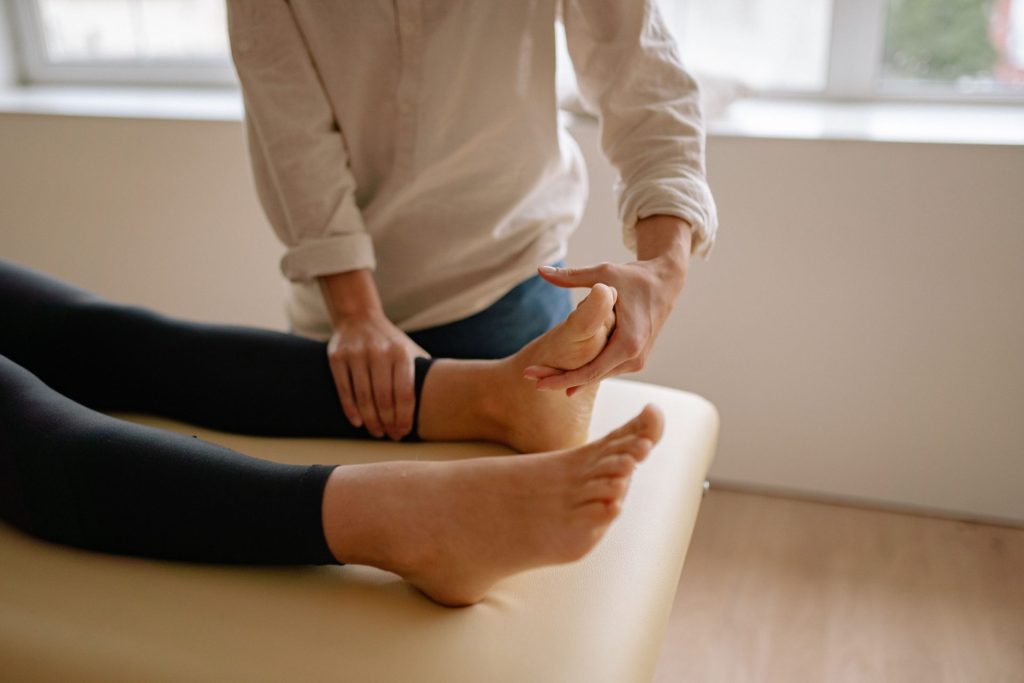 Close-up of a foot massage session promoting relaxation and wellness.
